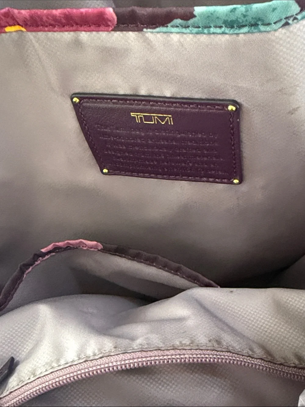 Tumi Men's Burgundy Nylon Backpack with Gold Hardware